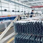 Vanway Tech industrial aluminum extrusion profiles in the manufacturing workshop, showing custom-shaped aluminum alloy extrusions during production, ideal for industrial equipment, automotive, and construction applications